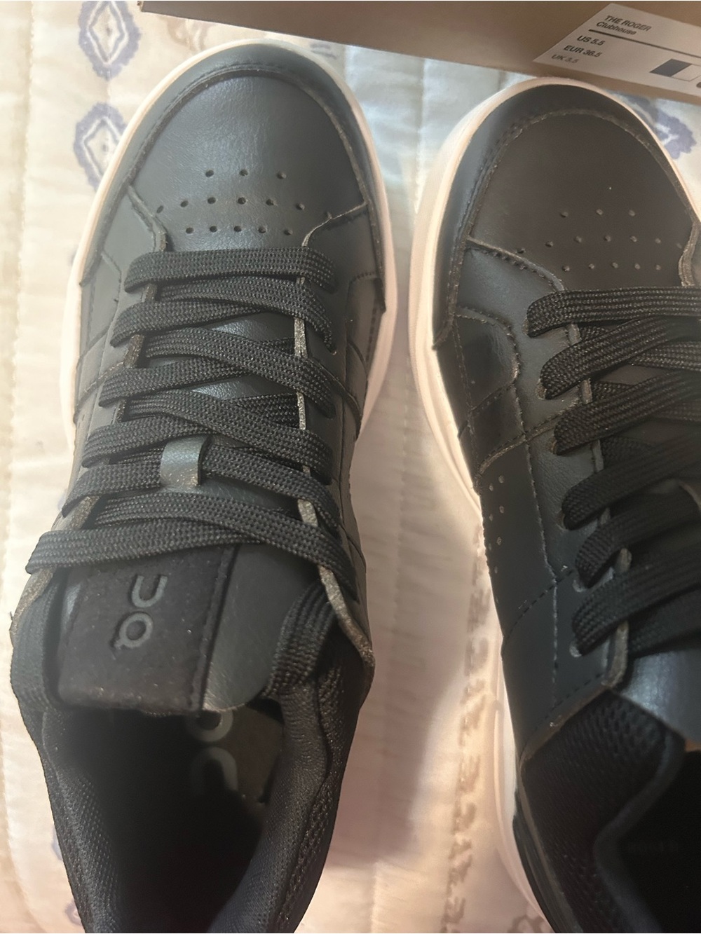 On Cloud Women’s Black Leather Low-Top Sneakers with White Sole